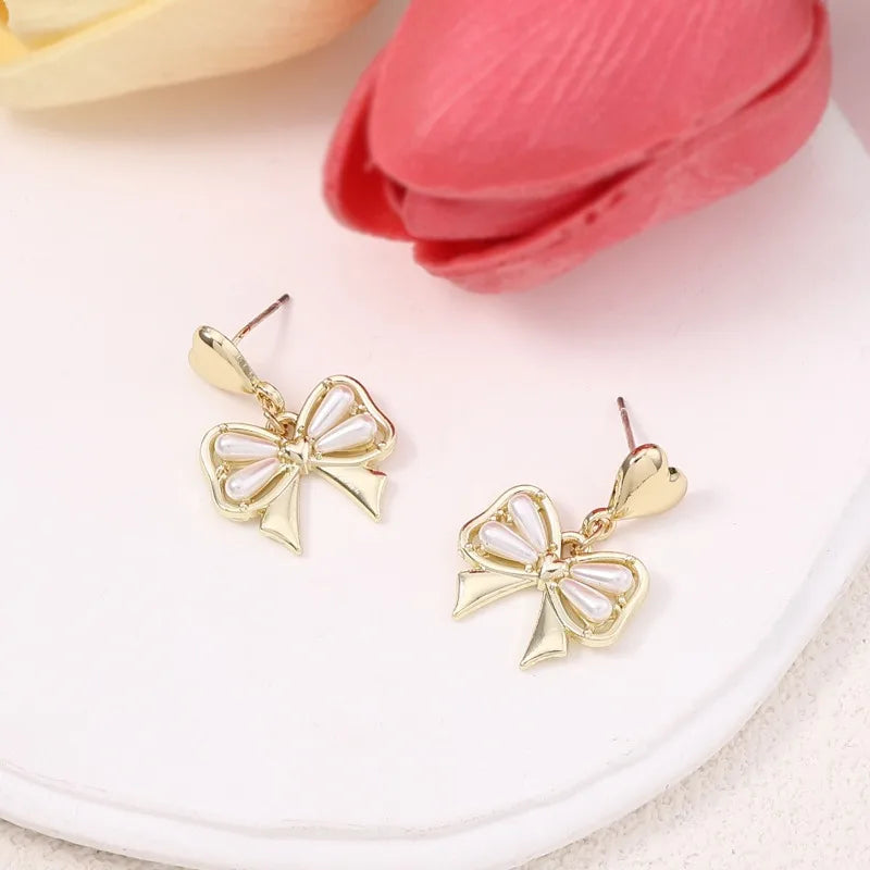 Korean Version of Sweet Internet Celebrity Mori Alloy Pearl Butterfly Niche Earrings, Fashionable Fairy Beauty Versatile Summer