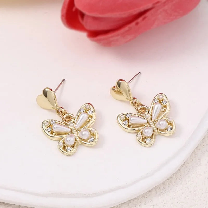 Korean Version of Sweet Internet Celebrity Mori Alloy Pearl Butterfly Niche Earrings, Fashionable Fairy Beauty Versatile Summer